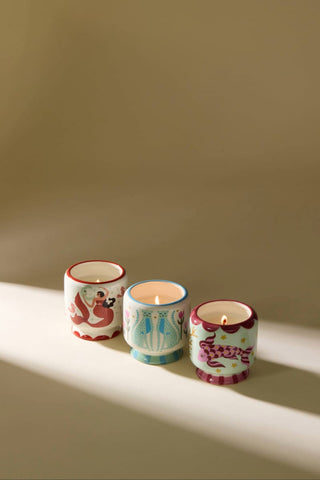 A Dopo hand-painted ceramic candles in a row