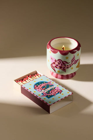 A Dopo Koi candle with Koi boxed matches