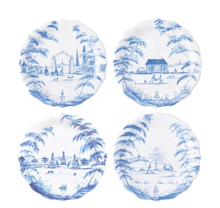 Four round white plates with blue hand-painted chinoiserie landscape scenes, arranged in a 2x2 grid on a white background.