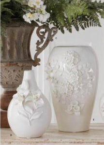 White ceramic bottleneck vase w/ raised lily flowers
